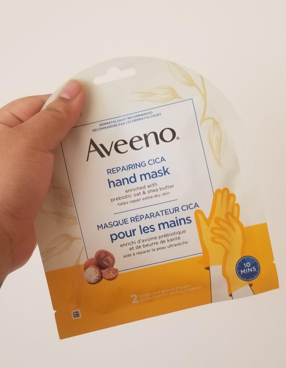 Aveeno Repairing CICA Hand Mask with Prebiotic Oat and Shea Butter. Image via Sarah Rohoman.