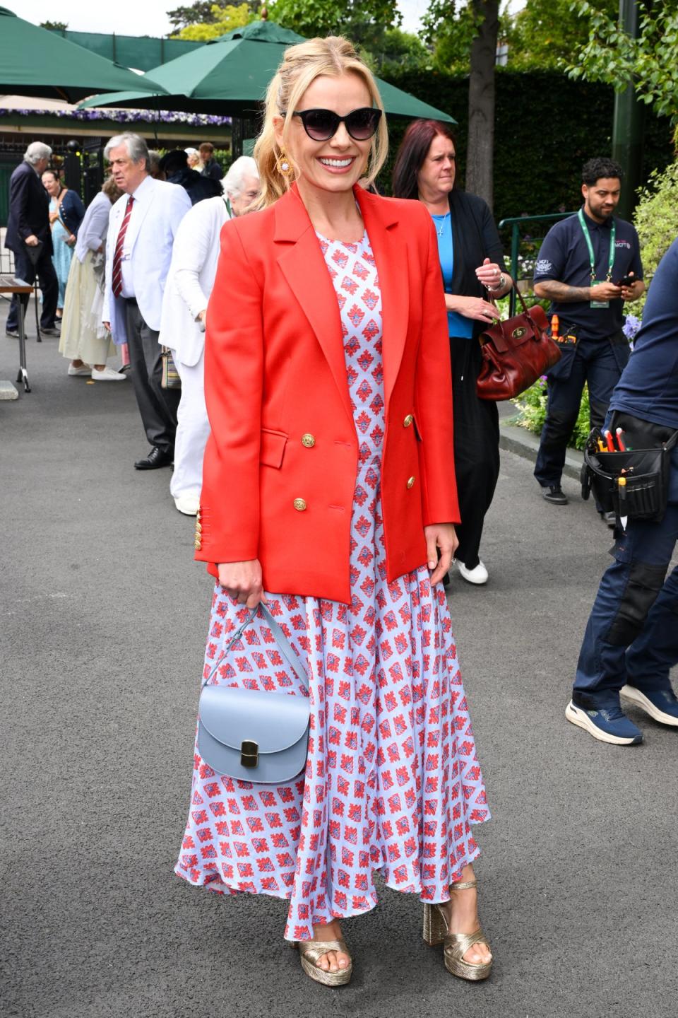 Katherine Jenkins was glowing in a blazer and long, flowing dress (WireImage)