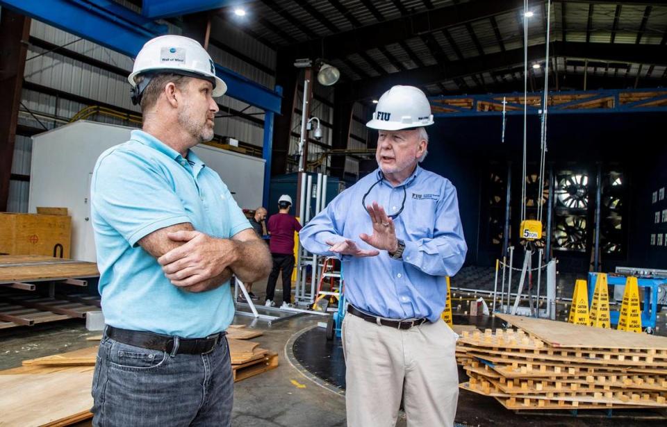 Steven Diaz, Ph.D, program director, left, and Richard Olson, Ph.D., director, talk about some of the research done at the International Hurricane Research Center in the FIU College of Engineering & Computing in Miami, on Dec. 14, 2021. Olson will be one of the 15 members of the FIU presidential search committee.