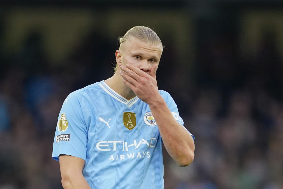 Manchester City's Erling Haaland reacts during the English Premier League soccer match between Manchester City and Arsenal at the Etihad stadium in Manchester, England, Sunday, March 31, 2024. (AP Photo/Dave Thompson)