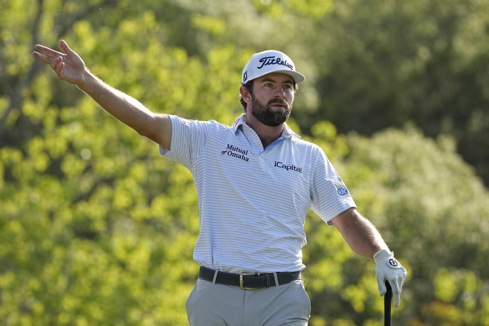 Cameron Young reacts to his drive on the second hole during a semifinal round at the Dell Technologies Match Play Championship golf tournament in Austin, Texas, Sunday, March 26, 2023. (AP Photo/Eric Gay)