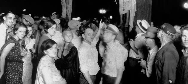 The lynching of Thomas Shipp and Abram Smith. The African-Americans were arrested as suspects, accused for robbery, murder and rape. An angry mob broke them from jail and proceeded to beat/lynch them. Marion, Indiana 1930. (Photo: Photo 12 via Getty Images)