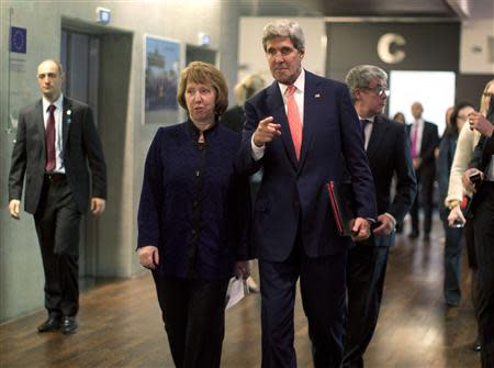 U.S. Secretary of State John Kerry (R) walks with European Union foreign policy chief Catherine Ashton before their meeting with Iranian Foreign Minister Mohammad Javad Zarif (not pictured) in Geneva, November 8, 2013. REUTERS/Jason Reed