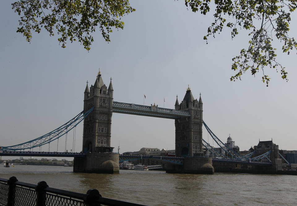 Tower Bridge is seen from near a cycle path in London, Thursday, May 24, 2012. There are many cycle paths across London that can be used to travel the capital. Like a runner or a swimmer, you would need to be physically fit. Like a goalie or a boxer, you should be prepared for close calls. But if you are coming to London's Summer Olympics _ and you have what it takes _ using a bicycle could be a great option in a city bracing for gridlock. (AP Photo/Kirsty Wigglesworth)