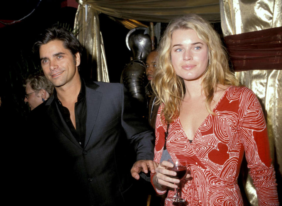 John Stamos and Rebecca Romijn in NYC in 1999.