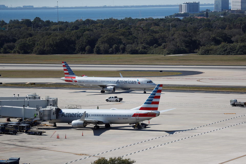 American Airlines planes are seen at the Tampa International Airport as airports around the country are awaiting for Verizon and AT&T to rollout their 5G technology, in Tampa, Florida, U.S., January 19, 2022. REUTERS/Octavio Jones