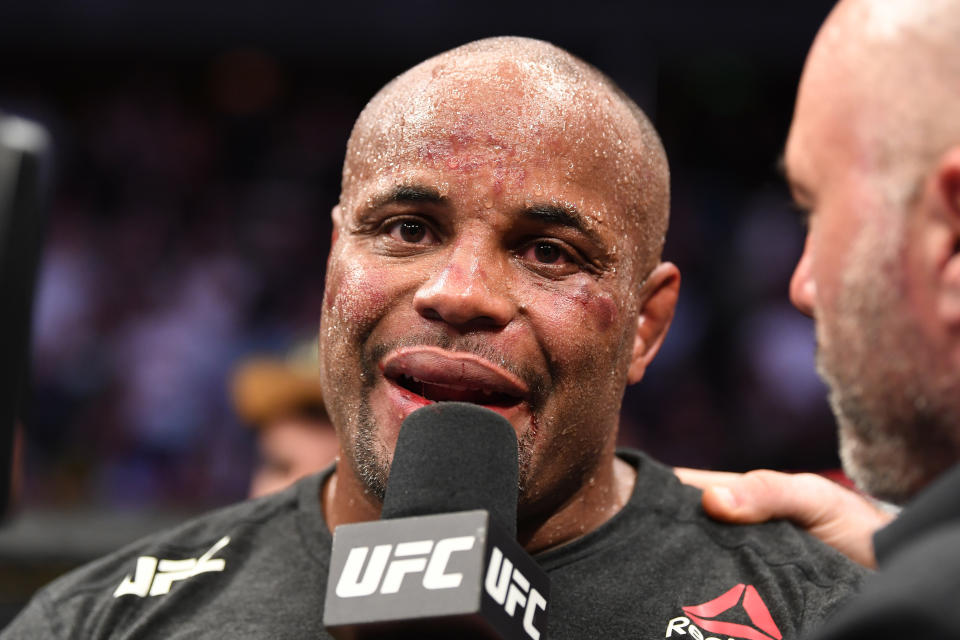 ANAHEIM, CALIFORNIA - AUGUST 17:  Daniel Cormier is interviewed after his TKO loss to Stipe Miocic in their heavyweight championship bout during the UFC 241 event at the Honda Center on August 17, 2019 in Anaheim, California. (Photo by Josh Hedges/Zuffa LLC/Zuffa LLC via Getty Images)