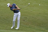 Justin Thomas hits to the first hole during the second round of the Wyndham Championship golf tournament in Greensboro, N.C., Friday, Aug. 4, 2023. (AP Photo/Chuck Burton)