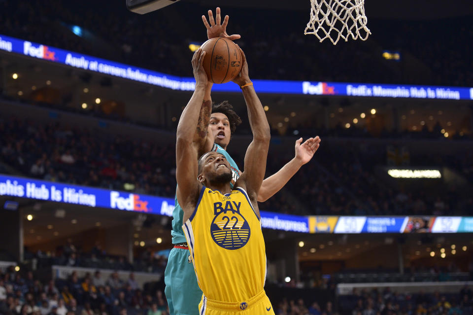 Golden State Warriors forward Glenn Robinson III (22) shoots ahead of Memphis Grizzlies forward Brandon Clarke in the first half of an NBA basketball game Sunday, Jan. 12, 2020, in Memphis, Tenn. (AP Photo/Brandon Dill)