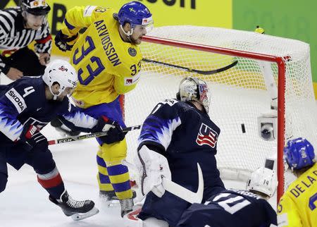 Ice Hockey - 2018 IIHF World Championships - Semifinals - Sweden v USA - Royal Arena - Copenhagen, Denmark - May 19, 2018 - Viktor Arvidsson of Sweden scores. REUTERS/David W Cerny