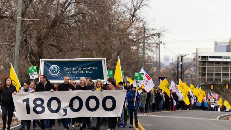 Attendees march at March for Life Utah at the Utah Capitol in Salt Lake City on Saturday, Jan. 20, 2024.