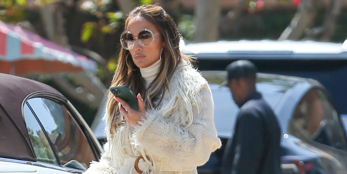 Jennifer Lopez Channeled a ‘70s Movie Star in a Fringe Belted Coat and ...