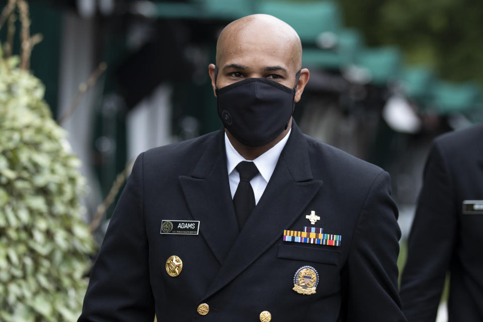 U.S. Surgeon General Jerome Adams departs after a television interview on the North Lawn of the White House, Tuesday, July 7, 2020, in Washington. (AP Photo/Alex Brandon)