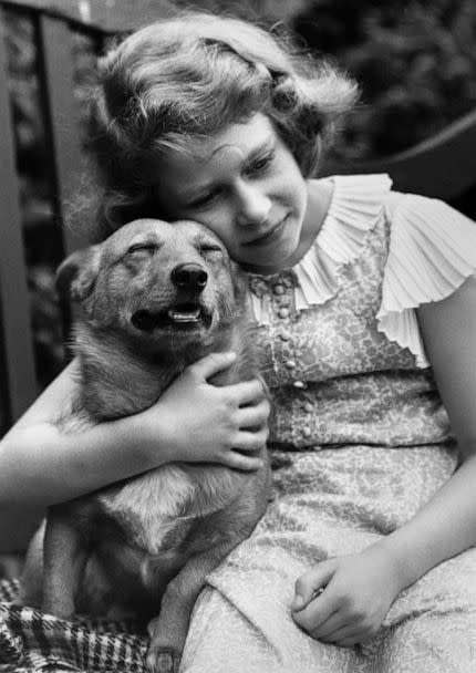 PHOTO: Princess Elizabeth, age 10, with her pet dog, in July 1936, in London. (Hulton Deutsch/Corbis via Getty Images)