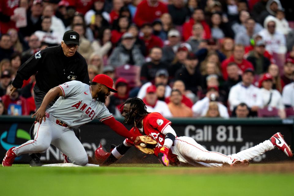 Elly De La Cruz walked four times in a game for the first time in his career but was caught stealing here as  Angels third baseman Luis Rengifo tagged him out in the fourth inning Saturday.