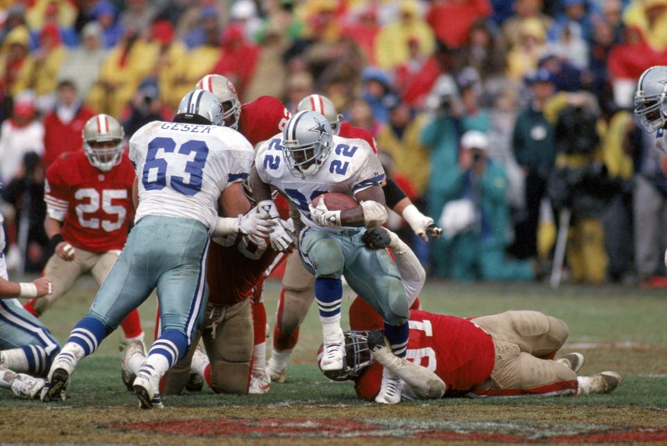 Emmitt Smith hustles for yards during the 1992 NFC championship game against the San Francisco 49ers at Candlestick Park.