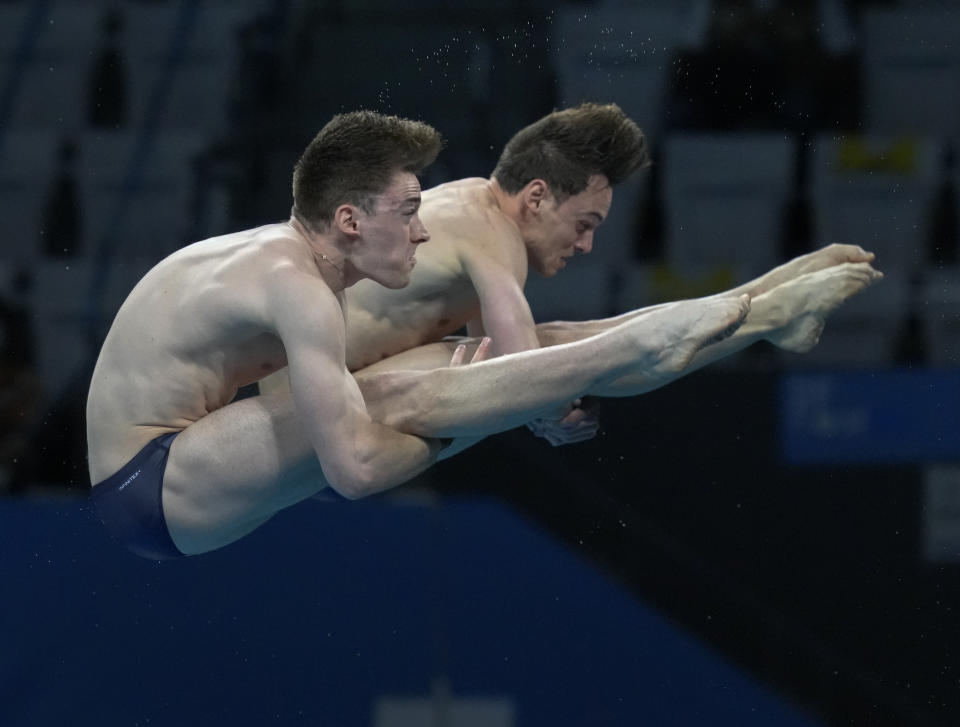 Thomas Daley and Matty Lee of Britain compete during the men's synchronized 10m platform diving final at the Tokyo Aquatics Centre at the 2020 Summer Olympics, Monday, July 26, 2021, in Tokyo, Japan. (AP Photo/Dmitri Lovetsky)