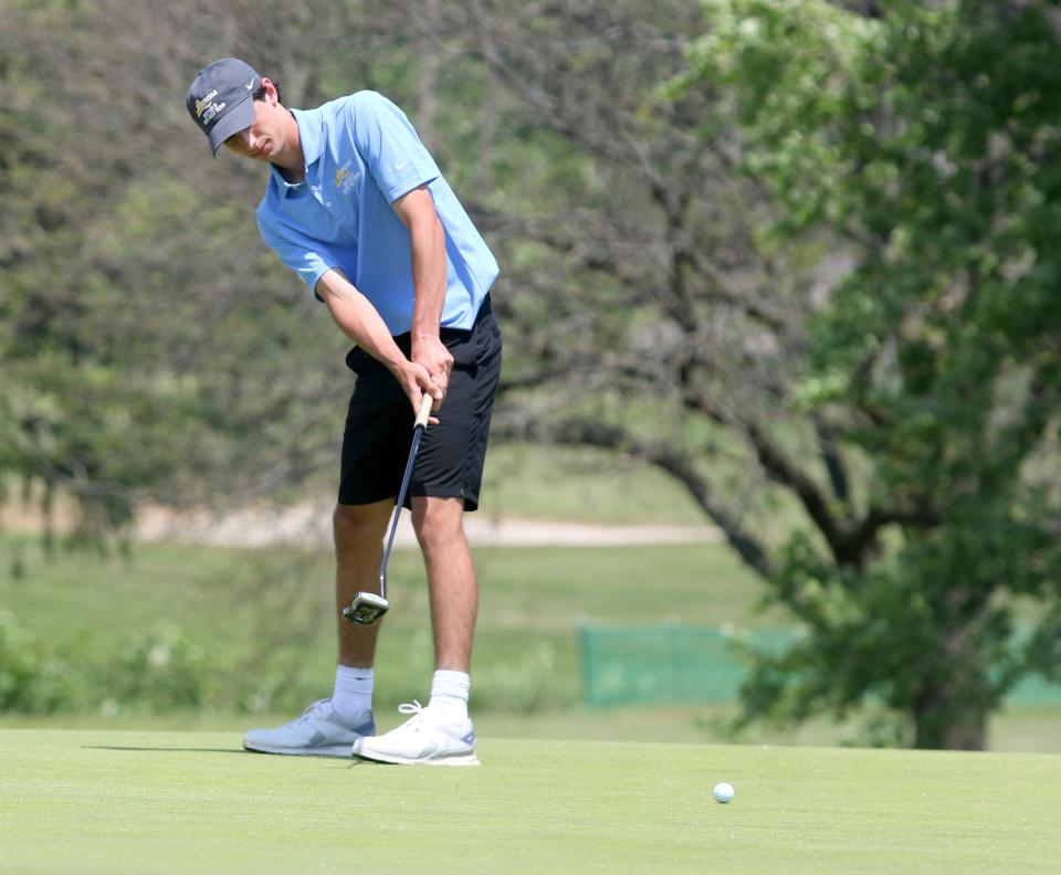 Ithaca's J.T. Thomforde putts on hole No. 18 during the New York State Public High School Athletic Association Boys Golf Championships at Elmira's Mark Twain Golf Course on June 6, 2022.