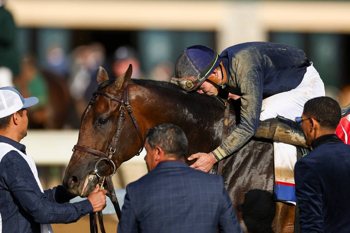 Tyler Gaffalione celebrates winning Saturday’s Toyota Blue Grass Stakes aboard Sierra Leone.