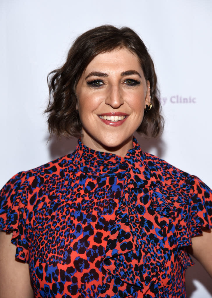 Mayim in a printed dress