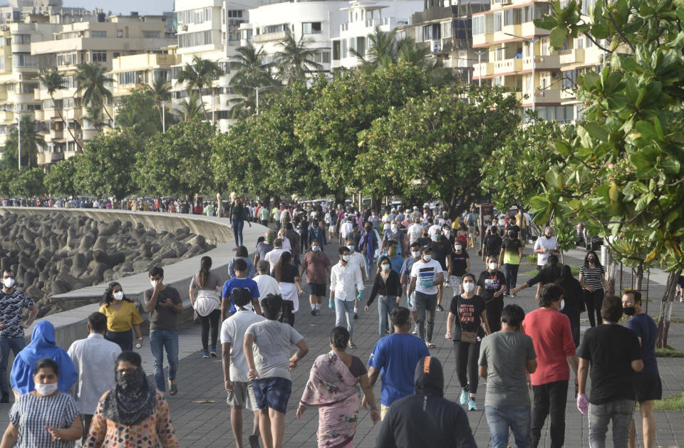 MUMBAI, INDIA - JUNE 7: Huge crowd walks at Marine drive during the first phase of Unlock 1.0, on June 7, 2020 in Mumbai, India. (Photo by Satyabrata Tripathy/Hindustan Times via Getty Images)