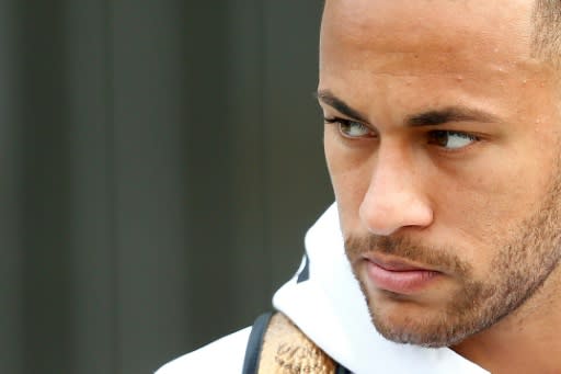 Brazil forward Neymar leaves his team's hotel in Kazan