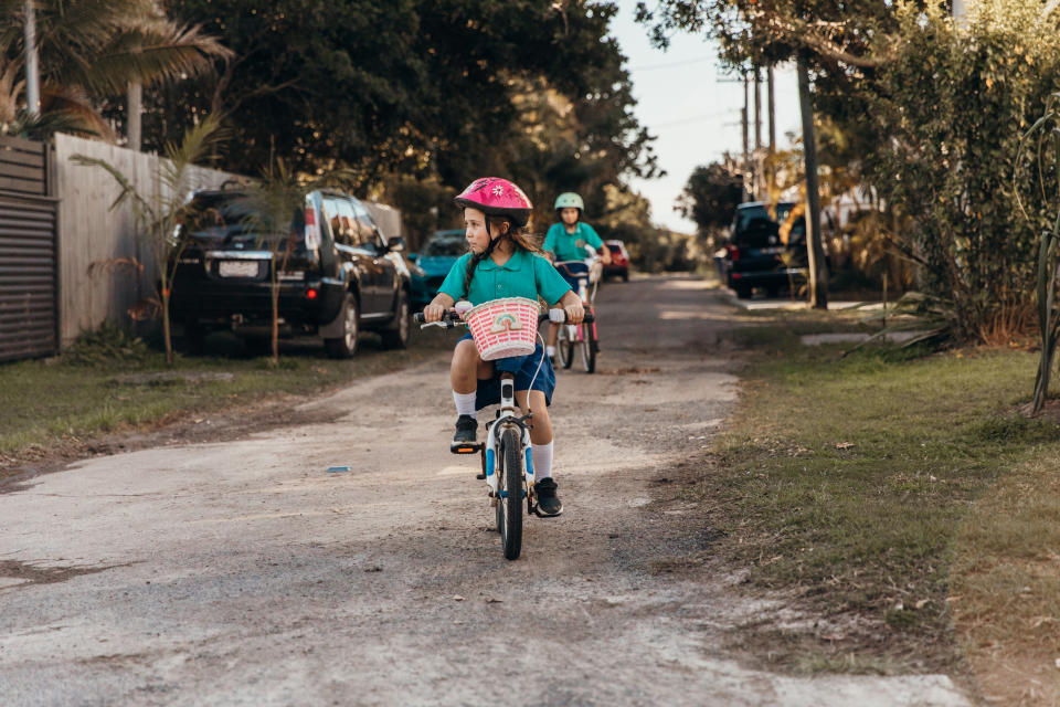 Girls riding their bikes after school. Source: Getty Images