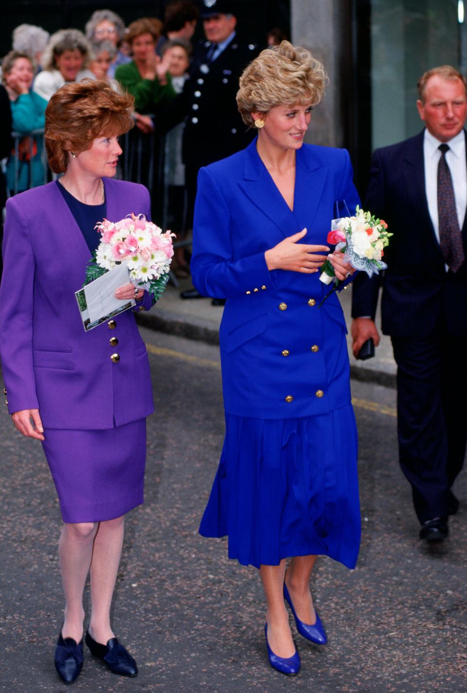 Princess Diana in a blue jacket and skirt in 1992.