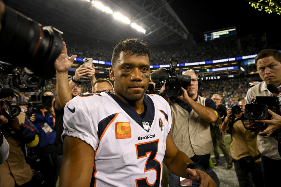 SEATTLE, WA - SEPTEMBER 12: Russell Wilson (3) of the Denver Broncos prepares to shake hands with head coach Pete Carroll of the Seattle Seahawks after the second half of Seattles 17-16 win at Lumen Field on Monday, September 12, 2022. (Photo by AAron Ontiveroz/MediaNews Group/The Denver Post via Getty Images)