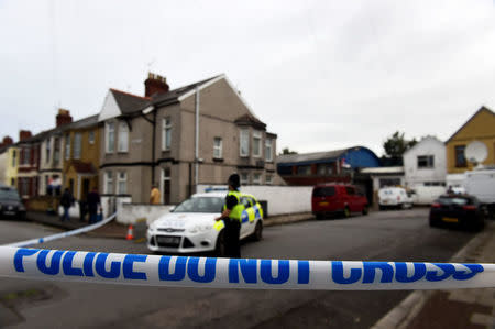 A police officer stands behind cordon tape after a man was arrested in connection with an explosion on the London Underground, in Newport, Wales, Britain, September 20, 2017. REUTERS/Rebecca Naden