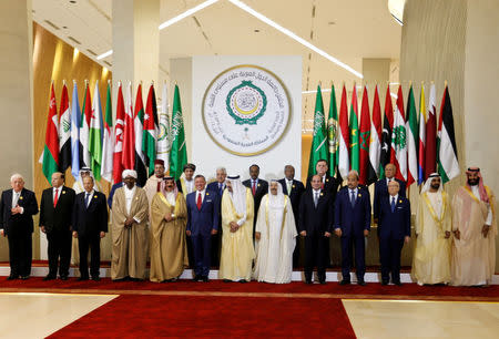 Arab leaders pose for the camera, ahead of the 29th Arab Summit in Dhahran, Saudi Arabia April 15, 2018. REUTERS/Hamad I Mohammed