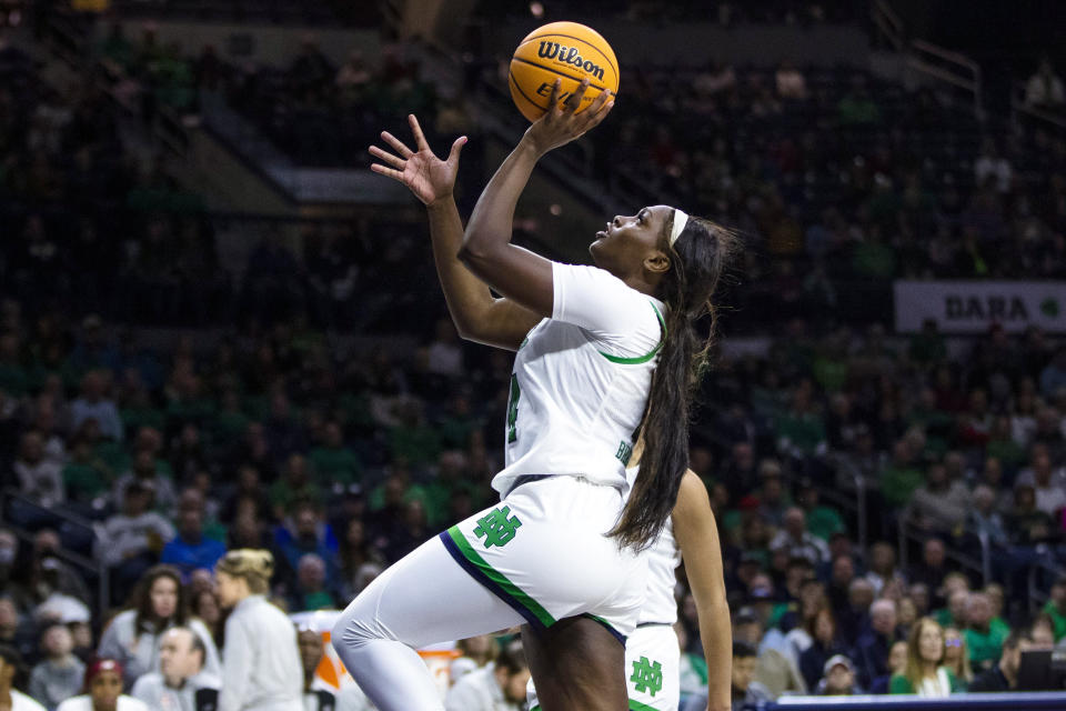 Notre Dame's KK Bransford (14) drives to the basket during the first half of an NCAA college basketball game against Boston College, Sunday, Jan. 1, 2023 in South Bend, Ind. (AP Photo/Michael Caterina)