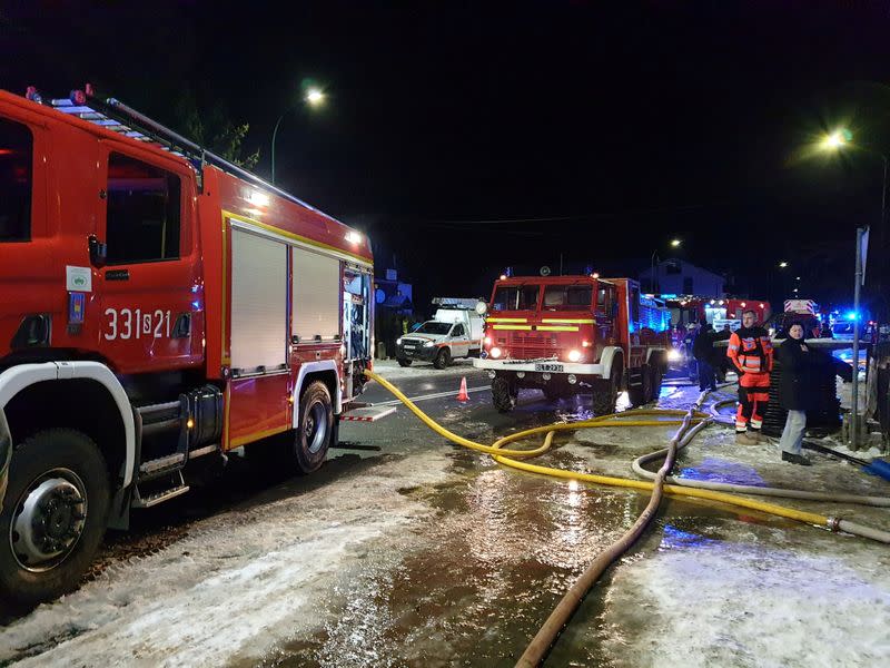 Fire trucks seen at site of building levelled by gas explosion in Szczyrk