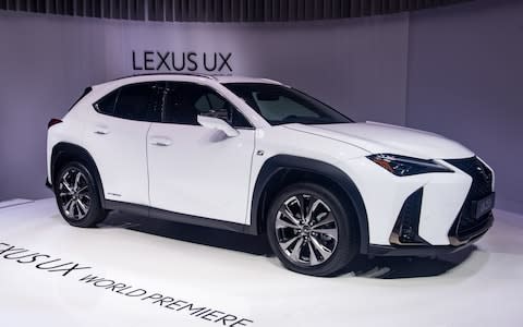 GENEVA, SWITZERLAND - MARCH 06: Lexus UX 250h is displayed at the 88th Geneva International Motor Show on March 6, 2018 in Geneva, Switzerland. Global automakers are converging on the show as many seek to roll out viable, mass-production alternatives to the traditional combustion engine, especially in the form of electric cars. The Geneva auto show is also the premiere venue for luxury sports cars and imaginative prototypes. (Photo by Robert Hradil/Getty Images)  - Credit: Robert Hradil /Getty