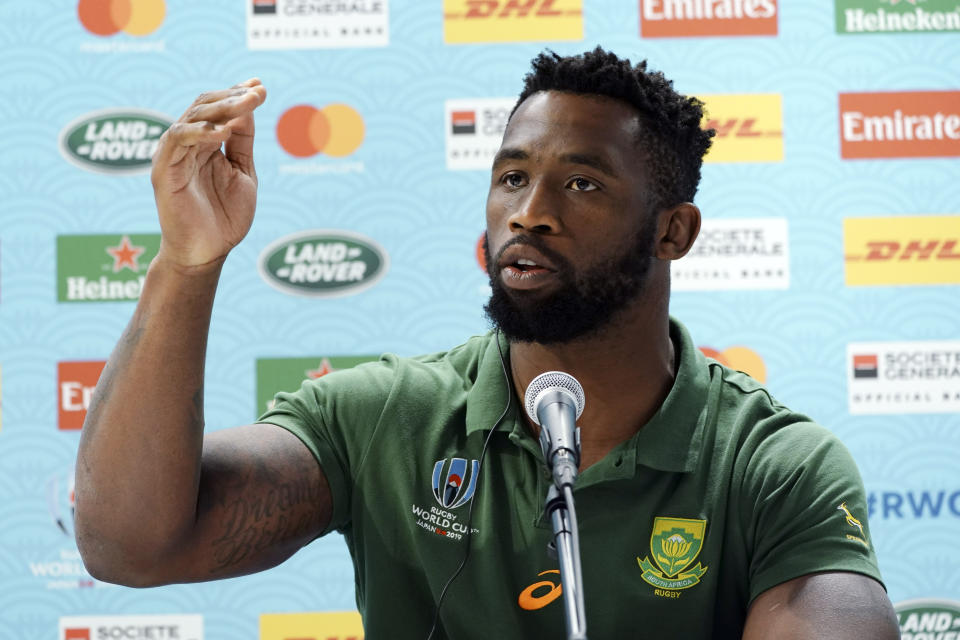 South Africa's captain Siya Kolisi speaks during a press conference ahead of the Rugby World Cup final game Friday, Nov. 1, 2019, in Tokyo. South Africa will play England in the final on Saturday Nov. 2. in Yokohama. (AP Photo/Eugene Hoshiko)