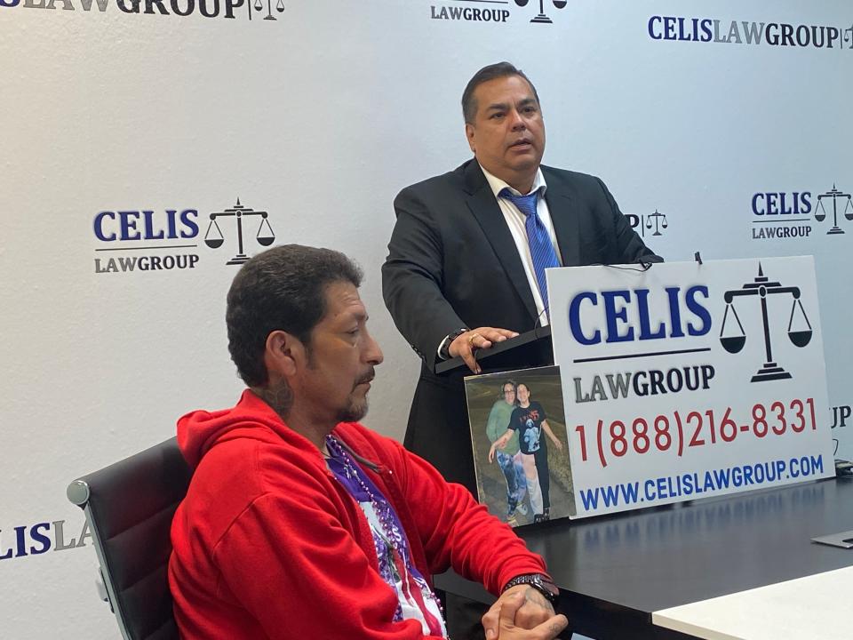 Robert Silva, seated, the father of an 11-year-old who was fatally shot on New Year's Day, appears at a press conference with attorney Mauricio Celis on Friday, Jan. 27, 2023. Robert Silva and Melinda Cruz, the parents of the late Amethyst Silva, hired Celis to investigate the Jan. 1 death of their daughter.