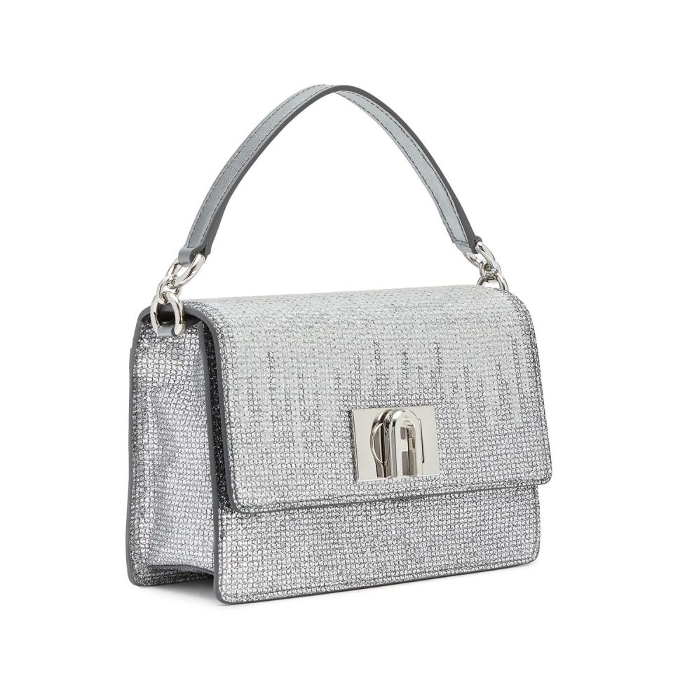 <p><strong>Who: </strong>Furla</p><p><strong>What: </strong>Limited-edition Gala bags</p><p><strong>Where:</strong> Available on <a href="https://go.redirectingat.com?id=74968X1596630&url=https%3A%2F%2Fwww.furla.com%2Fus%2Fen%2Feshop%2Flanding-pages%2Fgala-2021%2F&sref=https%3A%2F%2Fwww.elle.com%2Ffashion%2Fshopping%2Fg37500051%2Fthe-launch-septembers-hottest-fashion-launches%2F" rel="nofollow noopener" target="_blank" data-ylk="slk:furla.com;elm:context_link;itc:0;sec:content-canvas" class="link ">furla.com</a></p><p><strong>Why: </strong>Just in time for the Met Gala, Furla reimagines two of its most popular silhouettes in glamorous metallics that match the energy of fashion’s biggest night. Both the 1927 Soft bag and the Moon bag glisten with degrade metal studs and metal crossbody straps, embodying the nighttime excitement of New York. The Moon bag retails for $348 and the 1927 Soft retails for $428.</p><p><a class="link " href="https://go.redirectingat.com?id=74968X1596630&url=https%3A%2F%2Fwww.furla.com%2Fus%2Fen%2Feshop%2Flanding-pages%2Fgala-2021%2F&sref=https%3A%2F%2Fwww.elle.com%2Ffashion%2Fshopping%2Fg37500051%2Fthe-launch-septembers-hottest-fashion-launches%2F" rel="nofollow noopener" target="_blank" data-ylk="slk:SHOP NOW;elm:context_link;itc:0;sec:content-canvas">SHOP NOW</a></p>