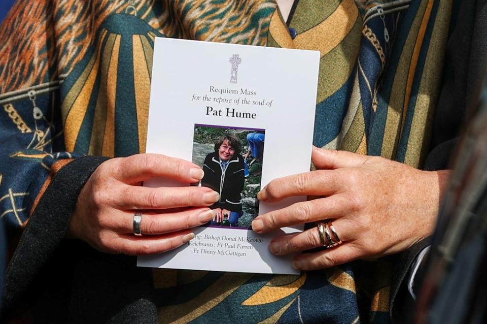 A mourner holds the order of service (Liam McBurney/PA) (PA Wire)