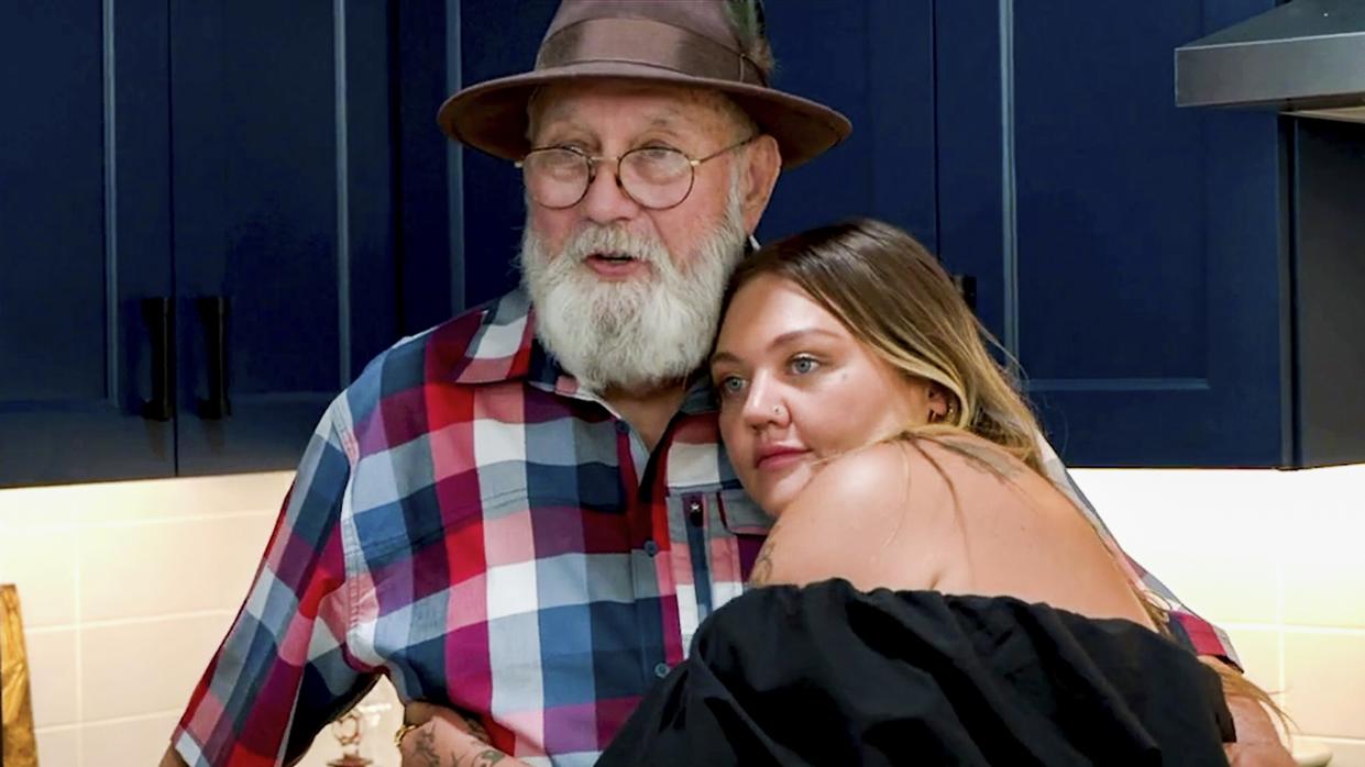  David “Papaw" King and Elle King hugging in Secret Celebrity Renovation season 3. 