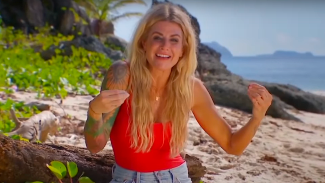  Carolyn talks on the beach during her intro interview for Survivor 44. 