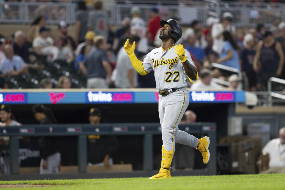 Pittsburgh Pirates' Andrew McCutchen (22) celebrates his three-run home run against the Minnesota Twins during the ninth inning of a baseball game Saturday, Aug. 19, 2023, in Minneapolis. (AP Photo/Bailey Hillesheim)
