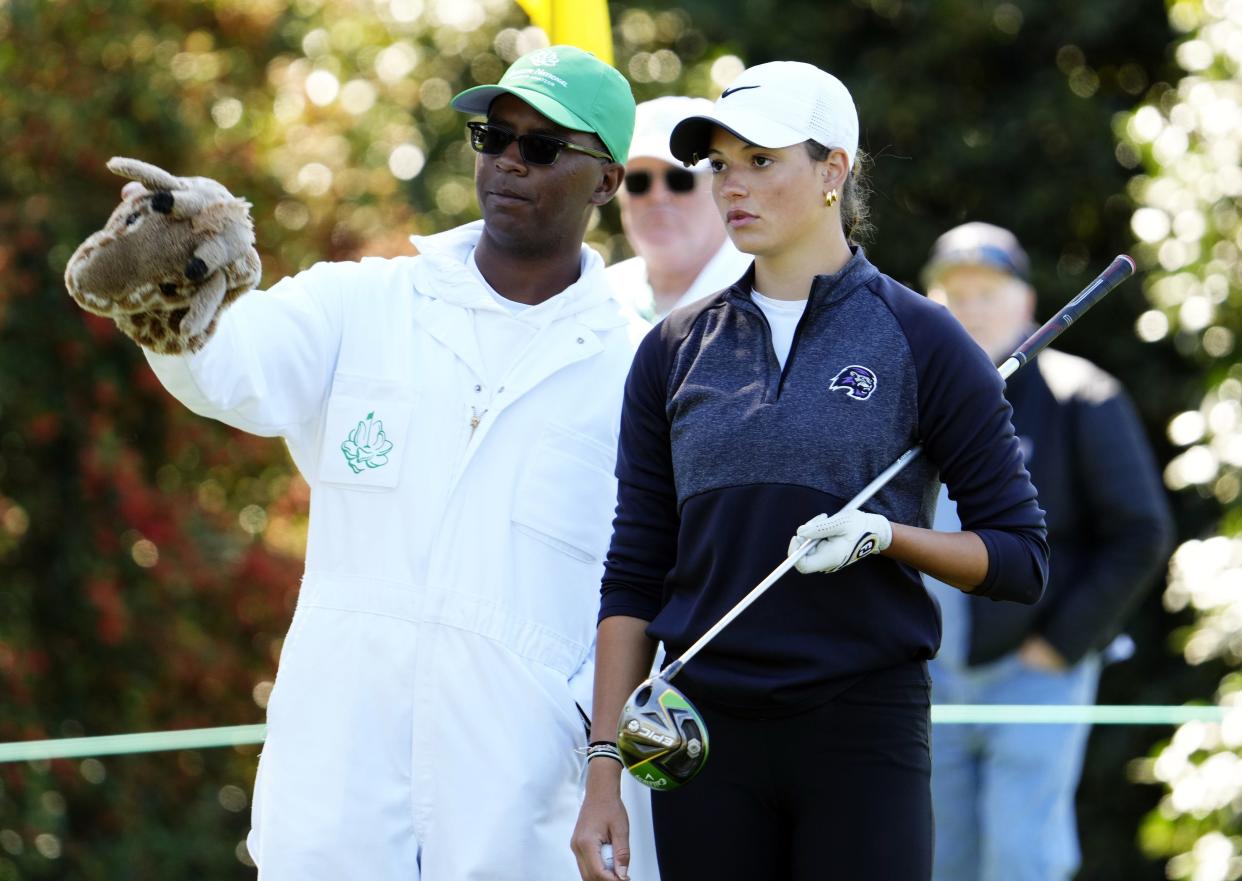 Paine College's Taya Buxton looks for a line with her caddie on the 18th tee on Saturday during the final round of the Augusta National Women's Amateur.