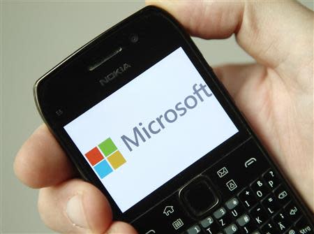 The Microsoft logo is displayed on a Nokia phone in Vienna September 3, 2013. REUTERS/Heinz-Peter Bader