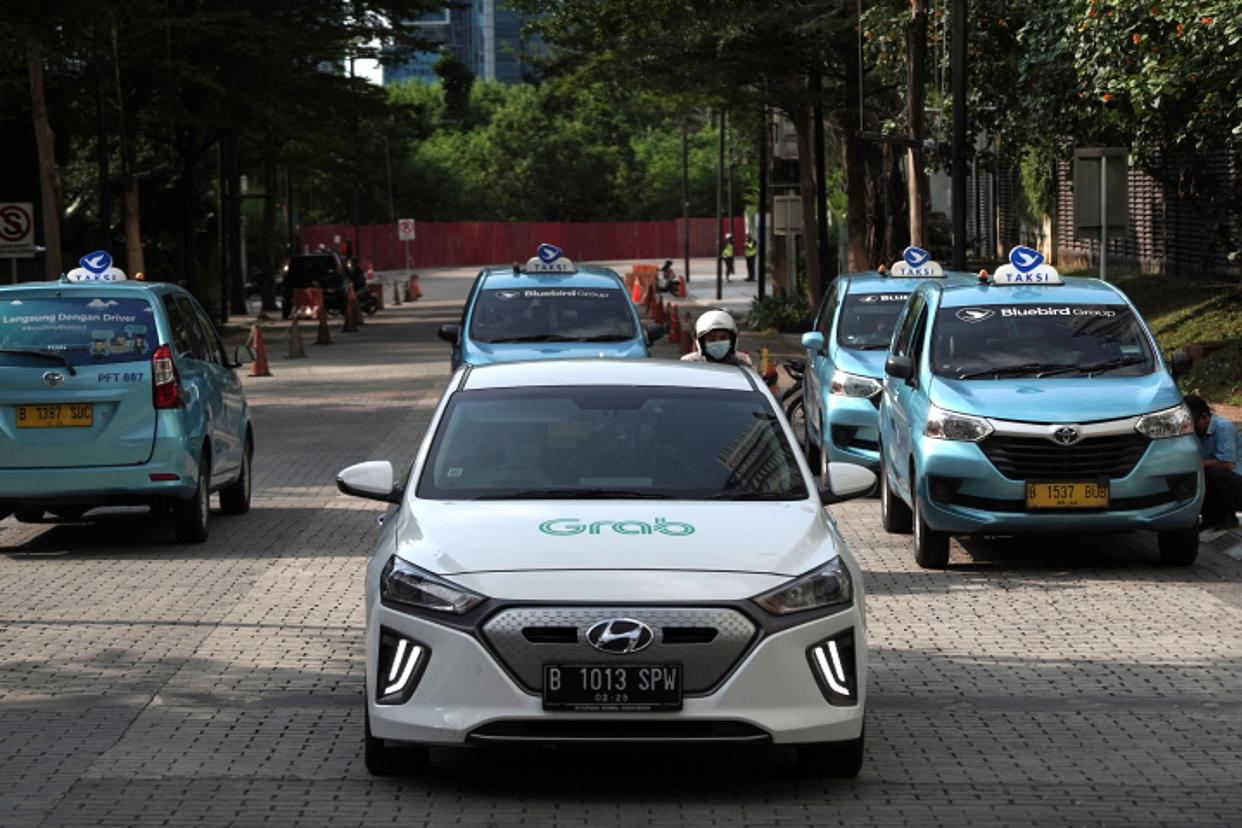 A GrabCar electric vehicle in Jakarta, Indonesia. Photographer: Dimas Ardian/Bloomberg