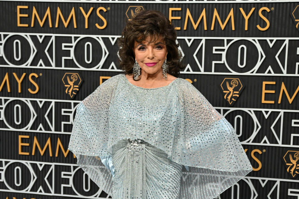 British actress Joan Collins arrives for the 75th Emmy Awards at the Peacock Theatre at L.A. Live in Los Angeles on January 15, 2024. (Photo by Robyn BECK / AFP) (Photo by ROBYN BECK/AFP via Getty Images)