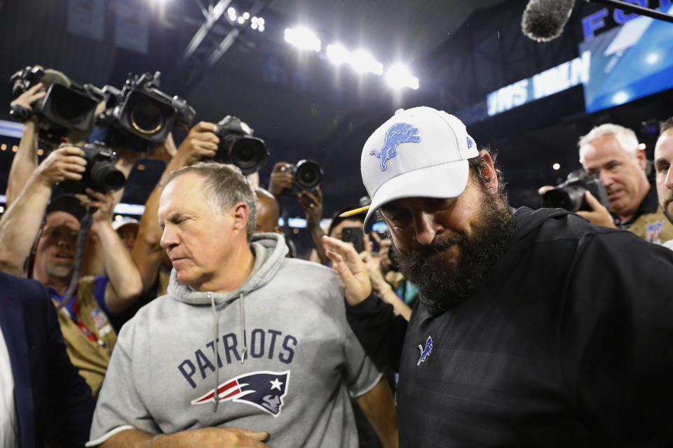 New England Patriots head coach Bill Belichick, left, and Detroit Lions head coach Matt Patricia meet after their teams' NFL football game, Sunday, Sept. 23, 2018, in Detroit. The Lions won 26-10. (AP Photo/Rick Osentoski)
