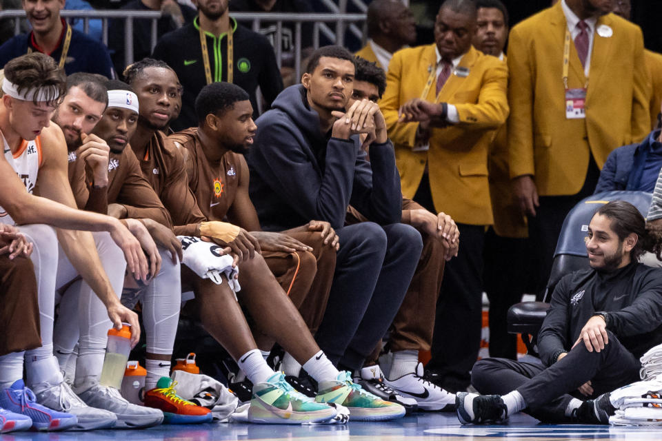 San Antonio Spurs center Victor Wembanyama looks on against the New Orleans Pelicans during the first game he did not play in during his rookie NBA season on Friday. (Stephen Lew/USA TODAY Sports)