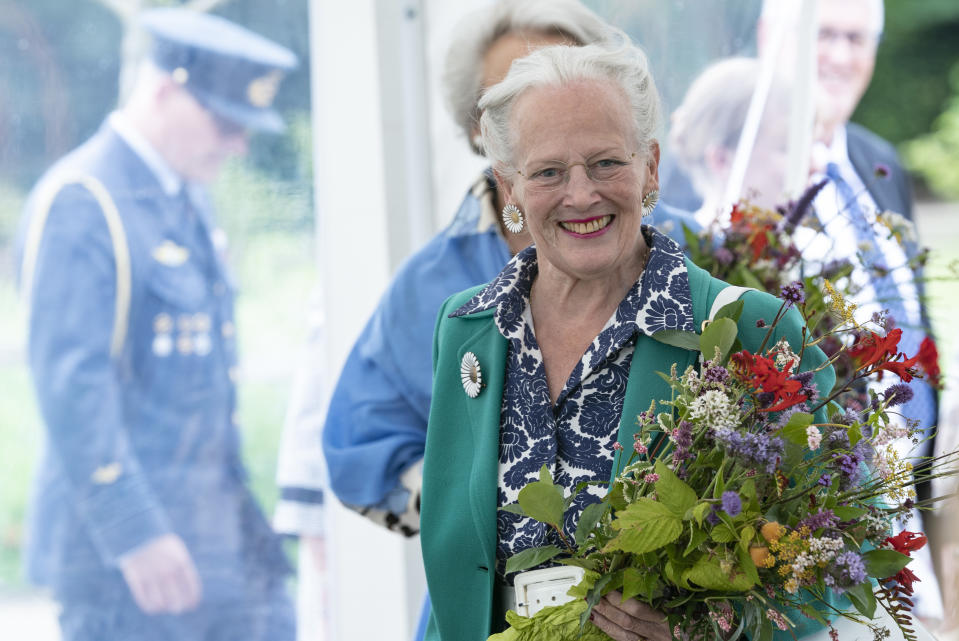 Queen Margrethe II of Denmark smiles as she opens the royal kitchen garden at Graasten Castle in Southern Jutland, July 24, 2020. - The "Royal Kitchen Garden" will be a new, regional tourist attraction in Southern Jutland, which will also be a local gathering place for teaching and activities that connect for sustainable cultivation of herbs, vegetables, berries and fruit. 