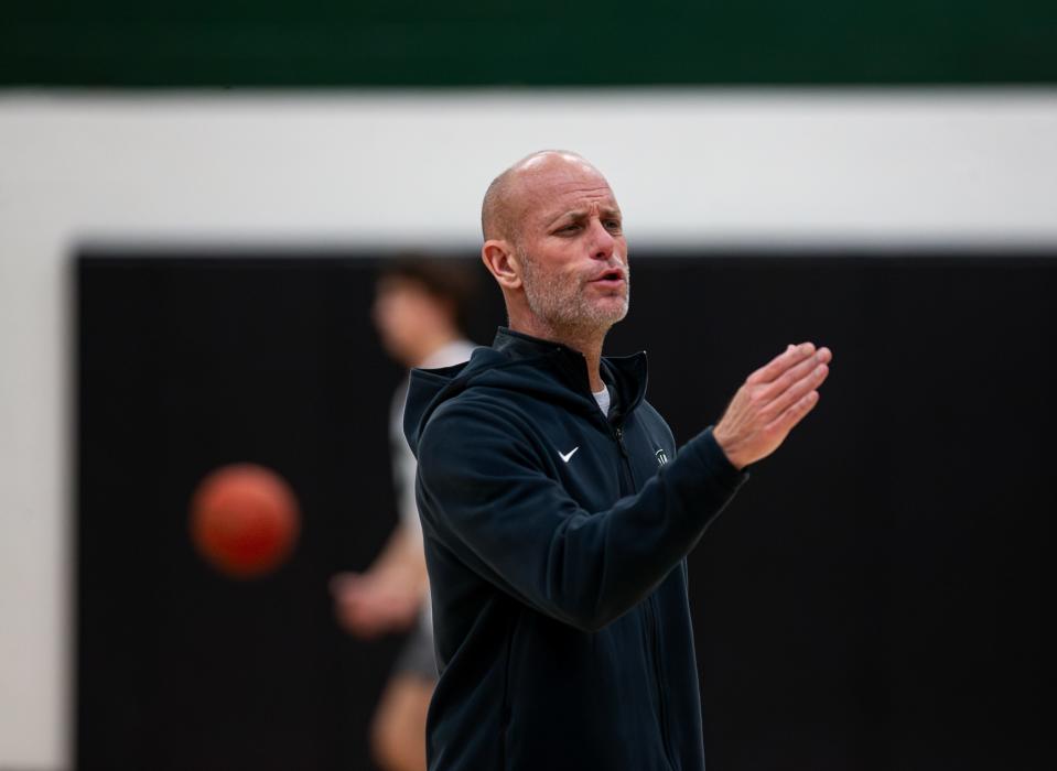 Trinity head basketball coach Mike Szabo instructed his team during a recent basketball practice session at Trinity High School's Steinhauser Gymnasium on Thursday, Nov. 16, 2023