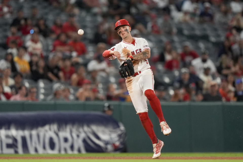 Los Angeles Angels shortstop Zach Neto throws out Detroit Tigers' Carson Kelly at first during the ninth inning of a baseball game, Thursday, June 27, 2024, in Anaheim, Calif. (AP Photo/Ryan Sun)